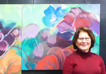 picture of Katherine Kadish at installation for Kettering CitySites paintings